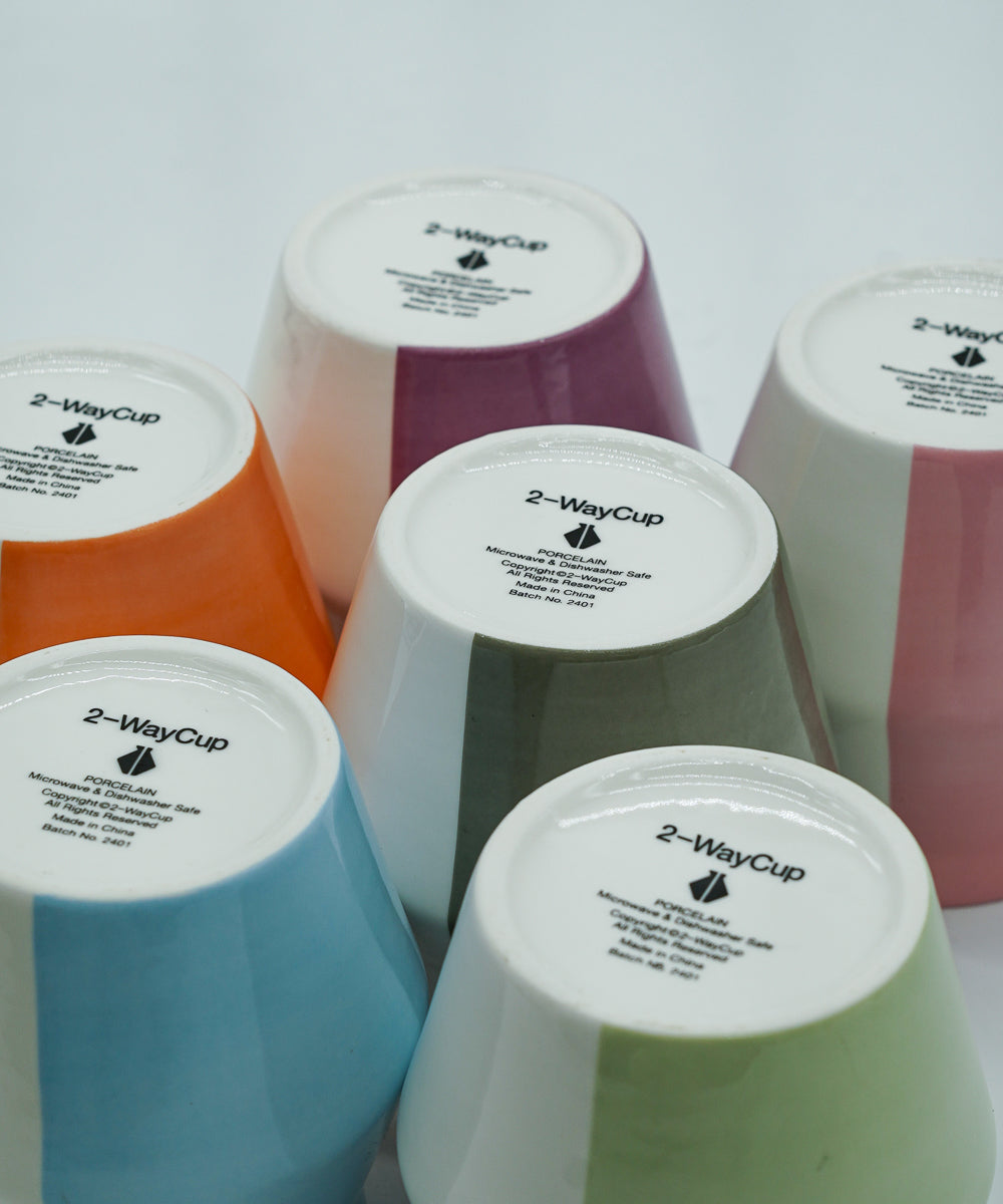 2-WayCup 330ml Refined Version set of tasting coffee cups in all six colors - blue, orange, green, purple, grey, and pink - turned upside down showing the2-waycup logo on the bottom of each