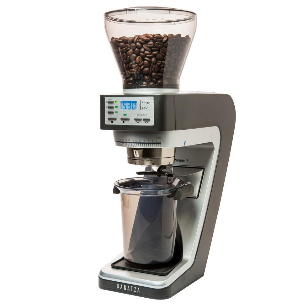 Coffee grinder with coffee beans on a white background