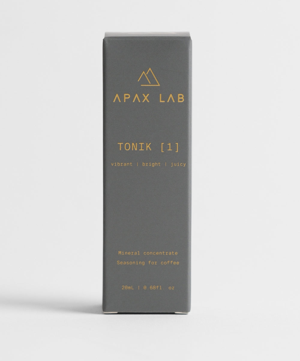 APAX Lab Tonik water mineral front view of box bottle on white surface with white background