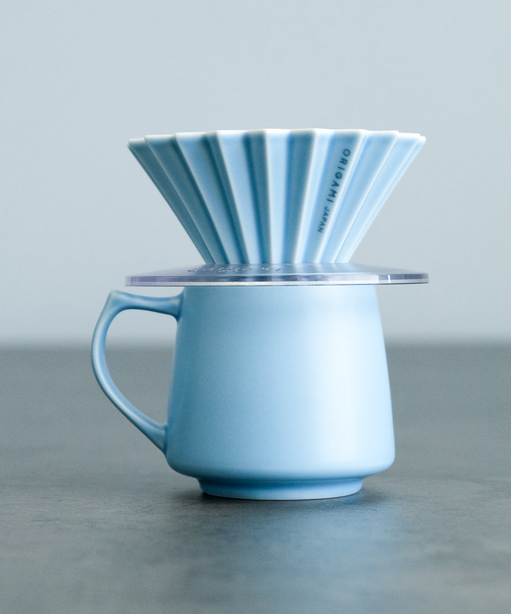 Side of Matte Blue Origami Japan Dripper and Ceramic Coffee Mug Cup