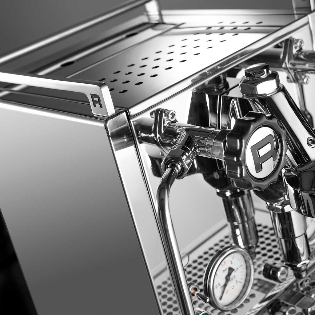 Rocket Cinquantotto Home Espresso machine front right close-up view of brand logo R on steam wand