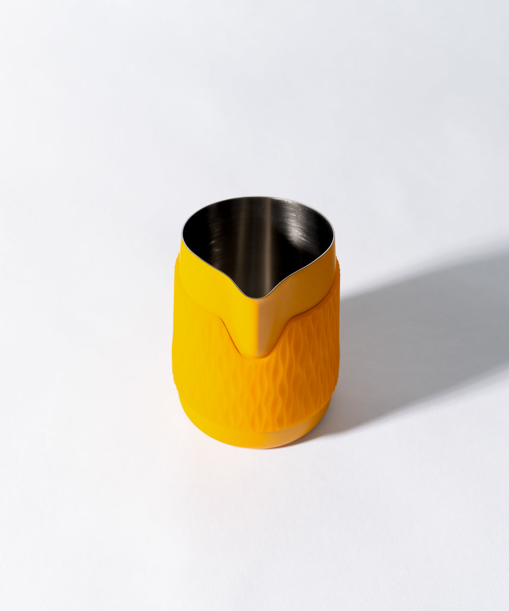 WPM Pitcher in Marigold showing spout detail designed for controlled, precise latte art pours