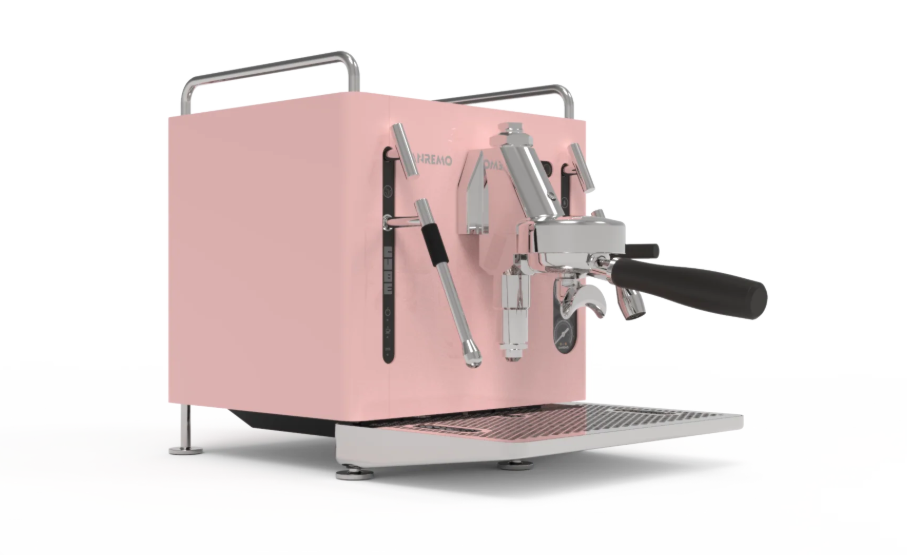 Sanremo CUBE A R home Espresso machine - candy pink rose on a white counter with white background